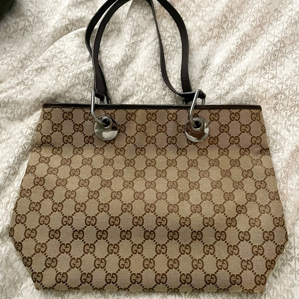 LIKE BRAND NEW!! Gucci Eclipse Canvas with Brown leather.